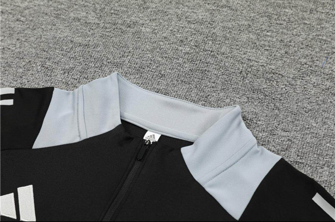 Manchester United Black and White Tracksuit - JerseyLegacy