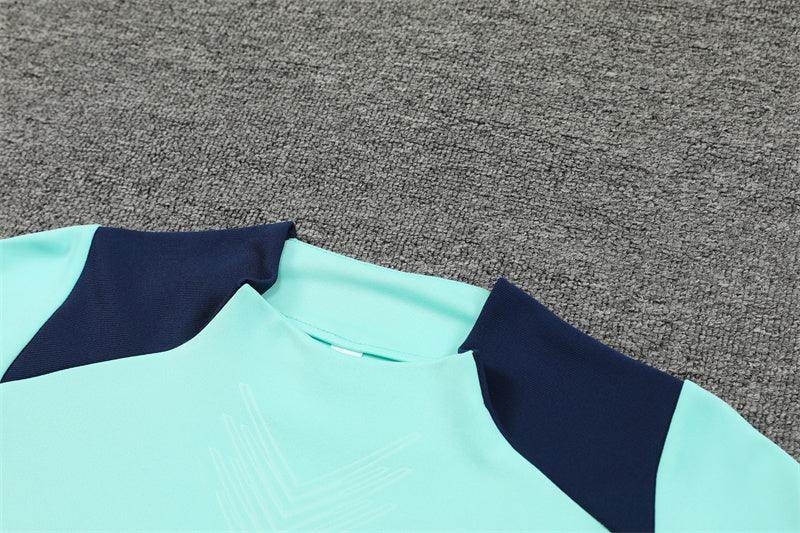Arsenal Blue and Mint Tracksuit - JerseyLegacy